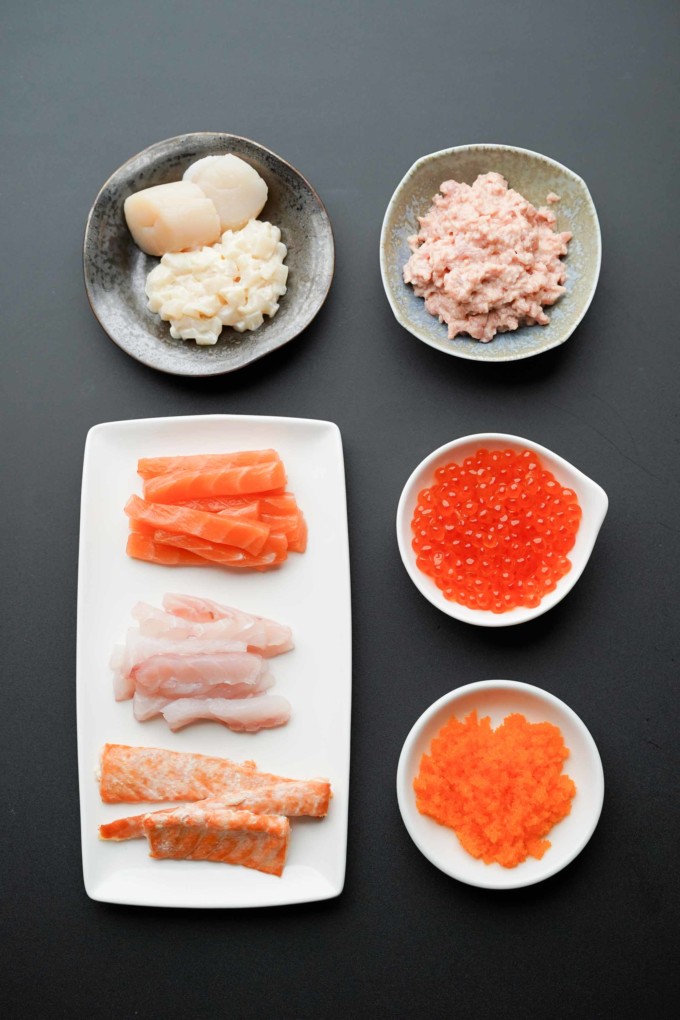 sliced fish, scallops, spicy tuna, and fish eggs for hand rolls