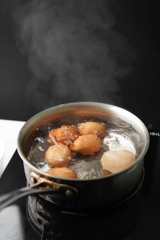 steamy pot of eggs boiling