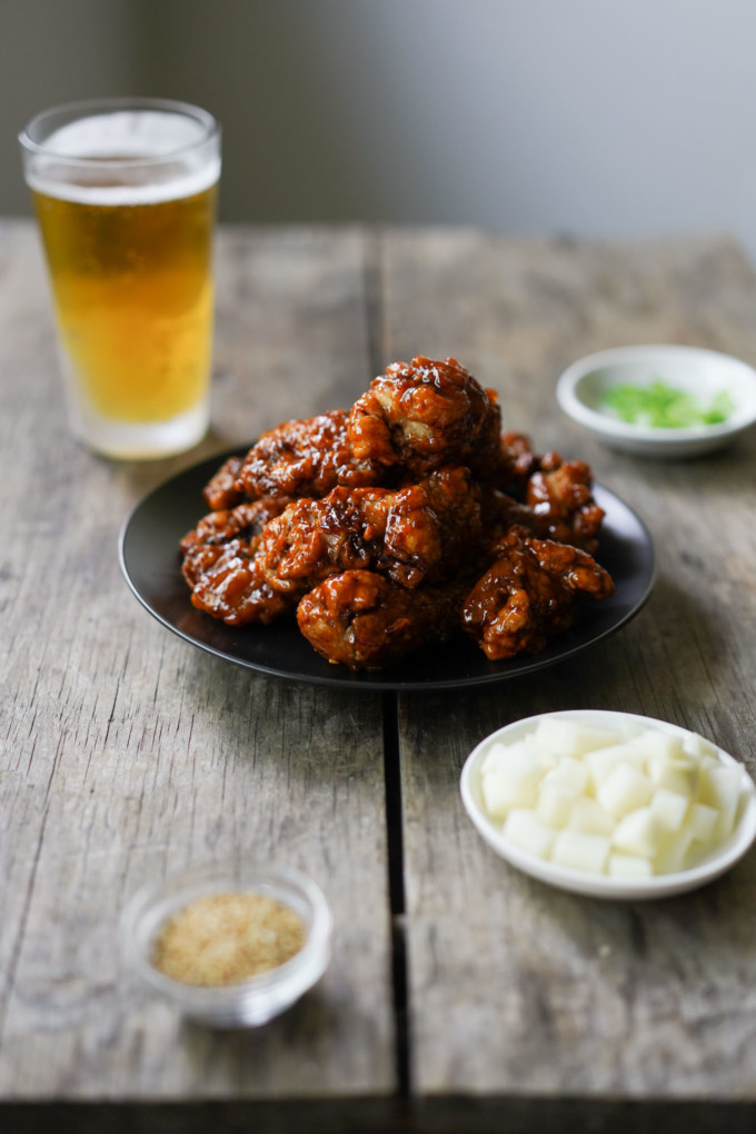 korean fried chicken with daikon pickles and beer