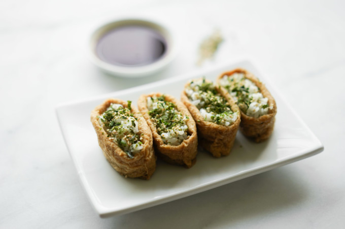 plate of inari with furikake and soy sauce