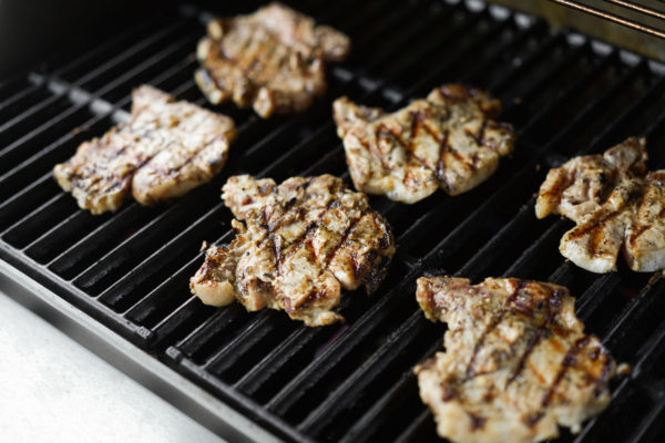 cooking Viet pork chops on the grill