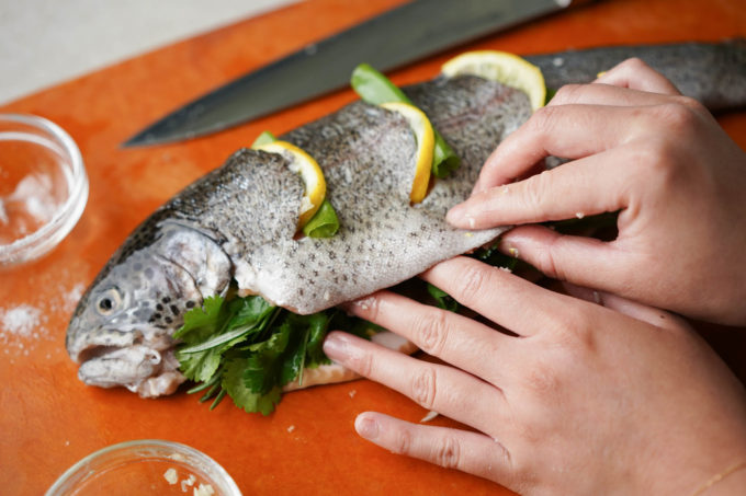 stuffing fish with lemon and herbs